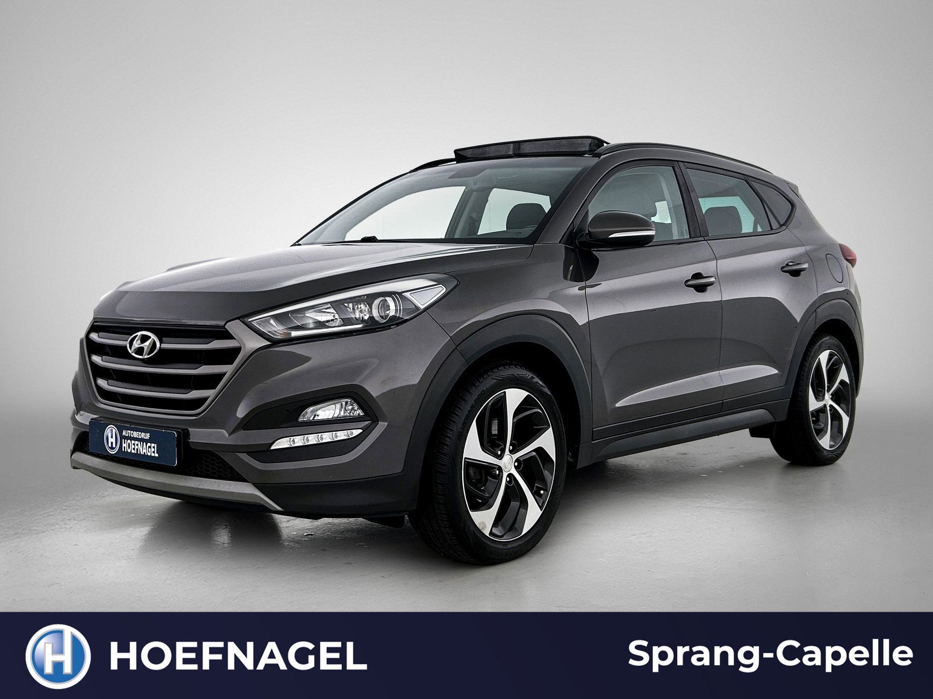 Hyundai Tucson 1.6 T-GDi Comfort 4WD | Trekhaak | Schuifdak, Auto's, Stof, Gebruikt, 4 cilinders, Bruin