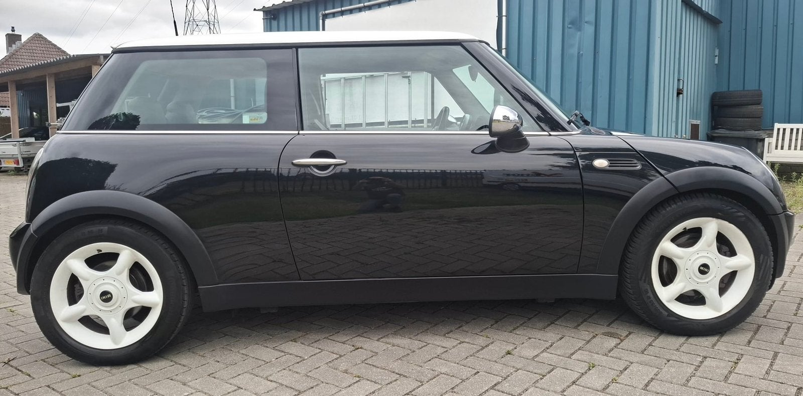 Mini 1.6 16V Cooper 2003 Zwart Airco, Sportvelgen, Voorwielaandrijving, 15 km/l, Lichtsensor, Zwart