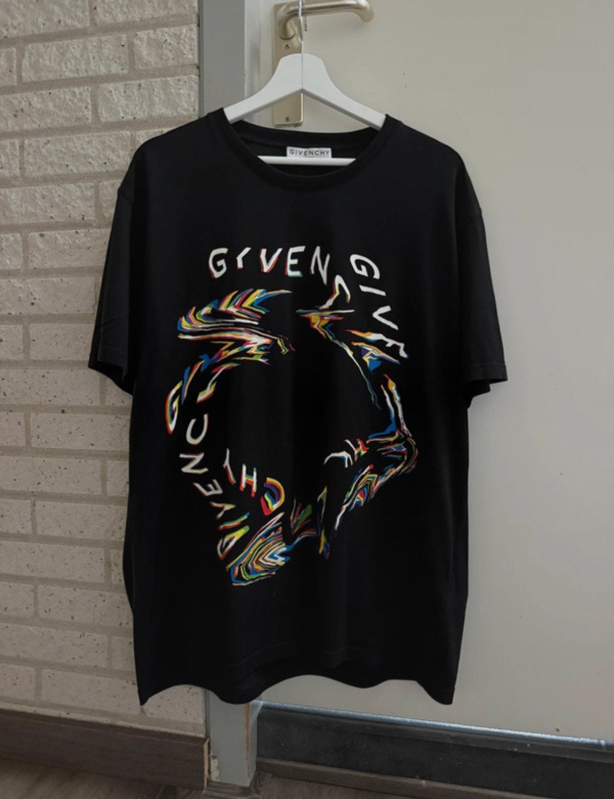 Authentiek Givenchy t-shirt, Ophalen of Verzenden, Zo goed als nieuw, Maat 52/54 (L), Zwart