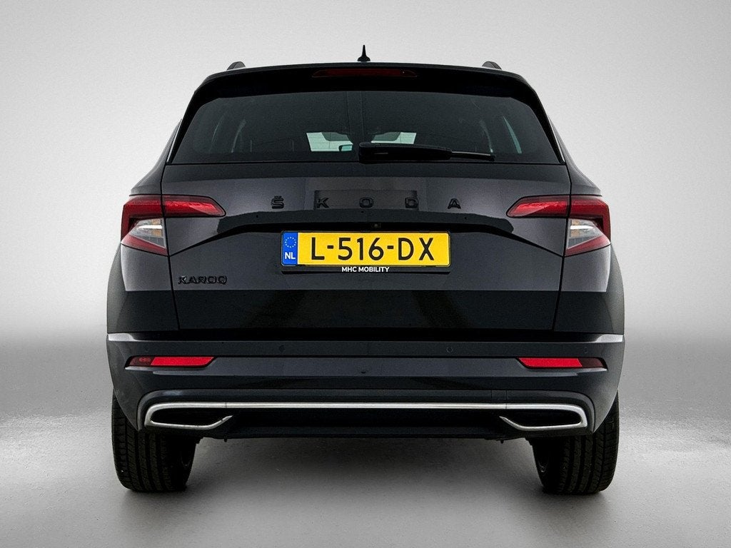 Skoda Karoq 1.5 TSI ACT Sportline Business | DSG | Comfort p, Auto's, Skoda, Stof, 4 cilinders, Automatische klimaatregeling, Zwart