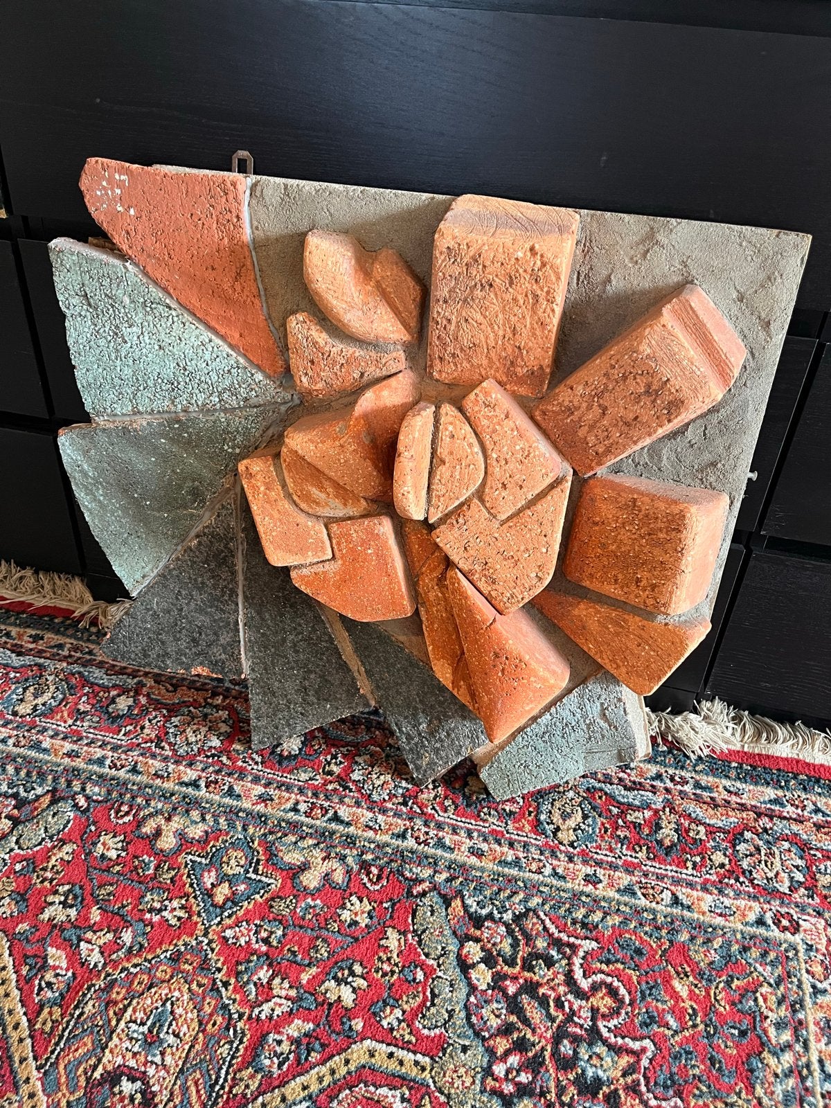 Wand kunstwerk brutalistisch, Ophalen