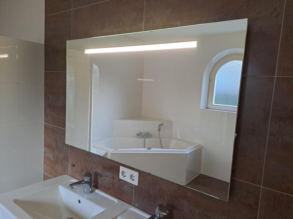 Te koop een badkamerspiegel met verlichting 120x75 cm, Ophalen, Gebruikt, 100 tot 125 cm, Minder dan 100 cm