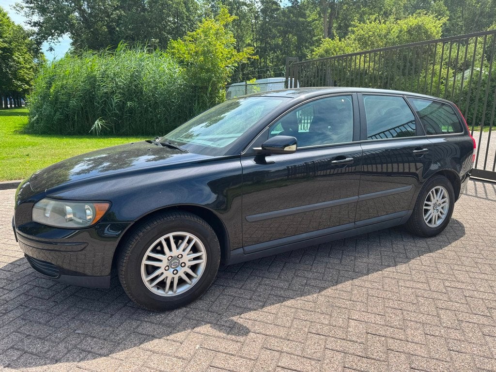 Volvo V50 1.8/NWE APK/ AIRCO/CRUISE/TREKHAAK/ELEKTRISCHE RAM, Auto's, Volvo, Voorwielaandrijving, Gebruikt, 4 cilinders, Zwart