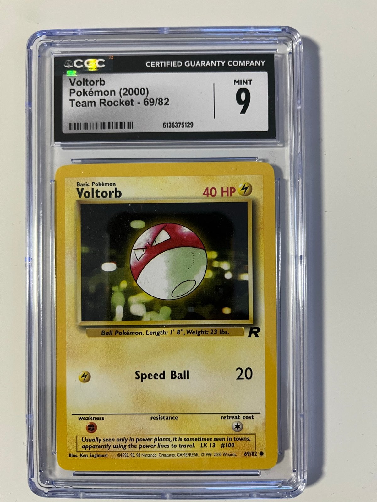 Pokémon Voltorb (2000) Team Rocket CGC 9 Mint, Ophalen of Verzenden, Zo goed als nieuw, Losse kaart