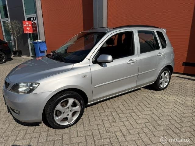 Mazda 2 1.4 Touring 132.000 KM NAP-AIRCO-APK 07-2027, Voorwielaandrijving, 1025 kg, Stof, 4 cilinders