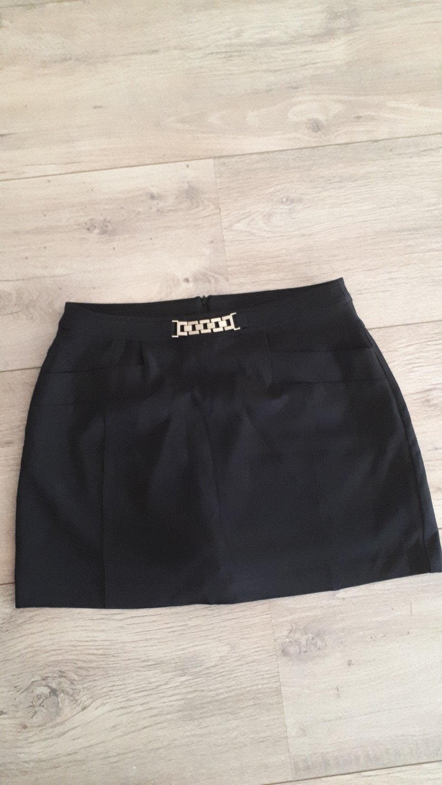 Nikkie zwarte mini rok met gouden detail, Kleding | Dames, Zwart, Maat 42/44 (L), Ophalen of Verzenden, Zo goed als nieuw