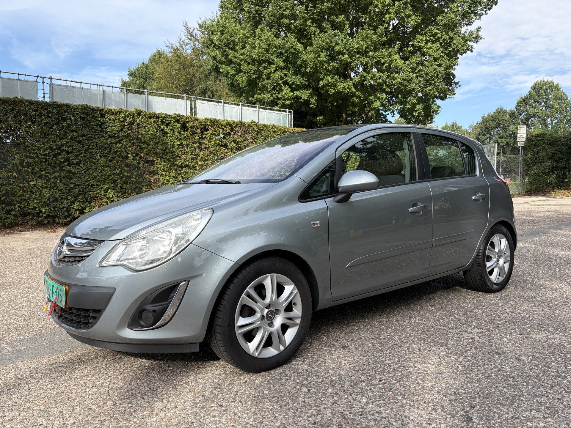 Opel Corsa 1.4-16V Cosmo (bj 2011), Auto's, Opel, Voorwielaandrijving, Euro 5, Gebruikt, 4 cilinders