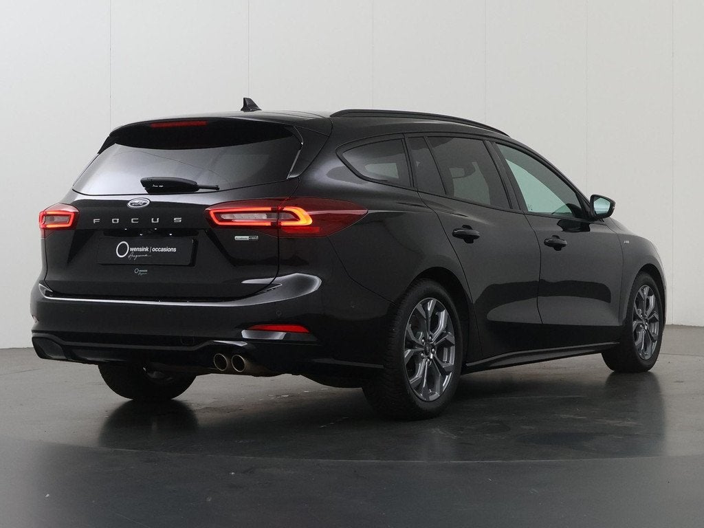 Ford Focus Wagon 1.0 EcoBoost Hybrid ST Line X | Afneembare, Auto's, Ford, Gebruikt, Zwart, Handgeschakeld, 19 km/l