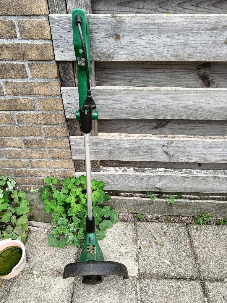 Grastrimmer met dito huismerk naam., Tuin en Terras, Overige merken, Gebruikt, Ophalen of Verzenden, 10 tot 30 cm