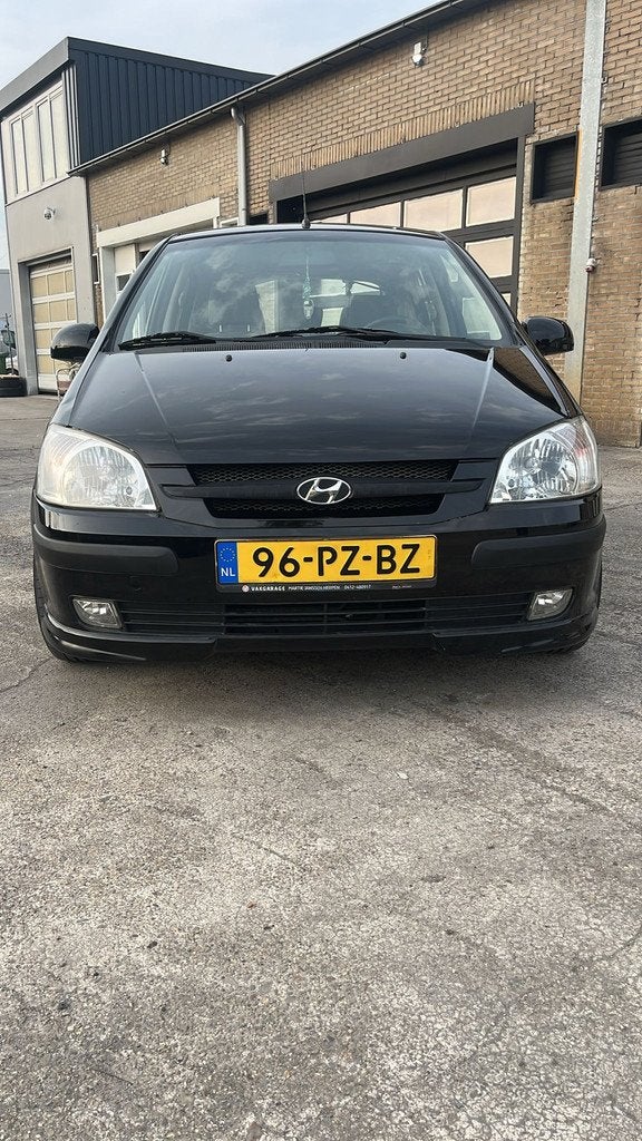 Hyundai Getz 1.6i-16V GLS Sound, Auto's, Voorwielaandrijving, 4 cilinders, Zwart, Origineel Nederlands