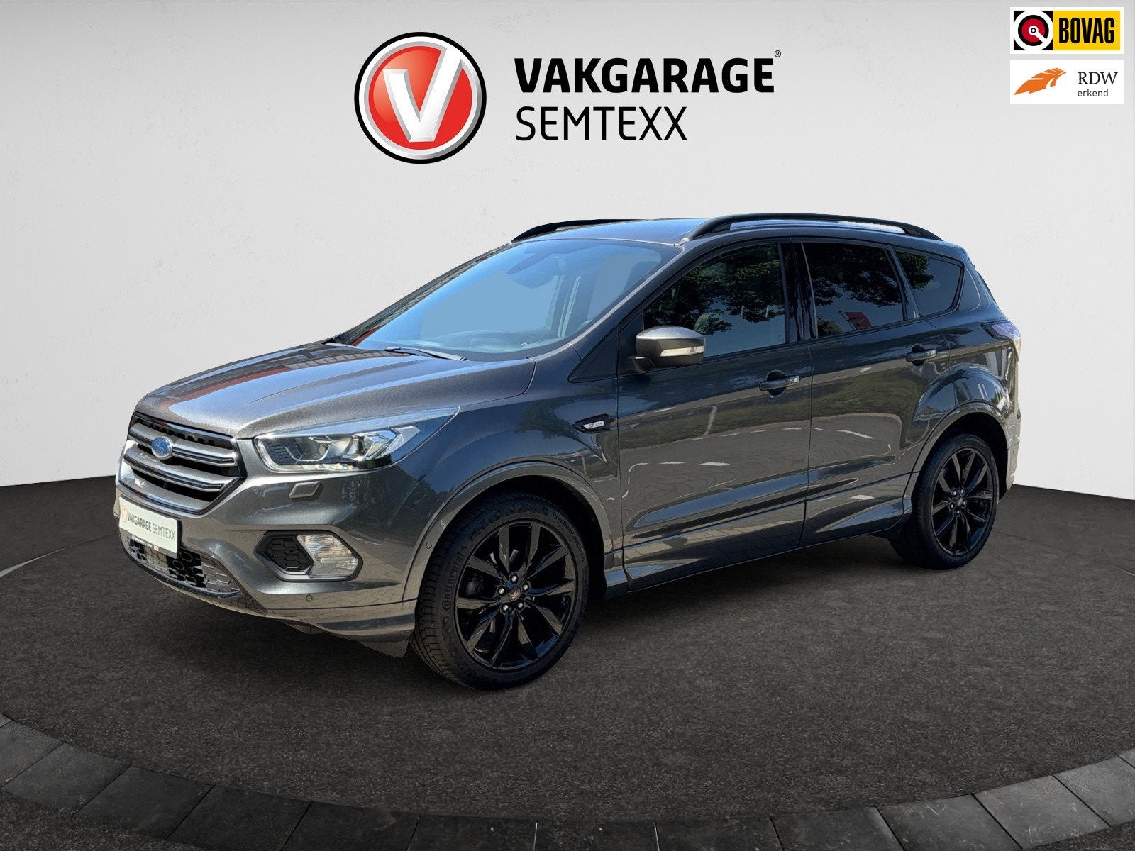 Ford Kuga 1.5 EcoBoost Vignale ST Line | Cruise | Camera | N, Auto's, 4 cilinders, Leder en Stof, Bedrijf, Handgeschakeld