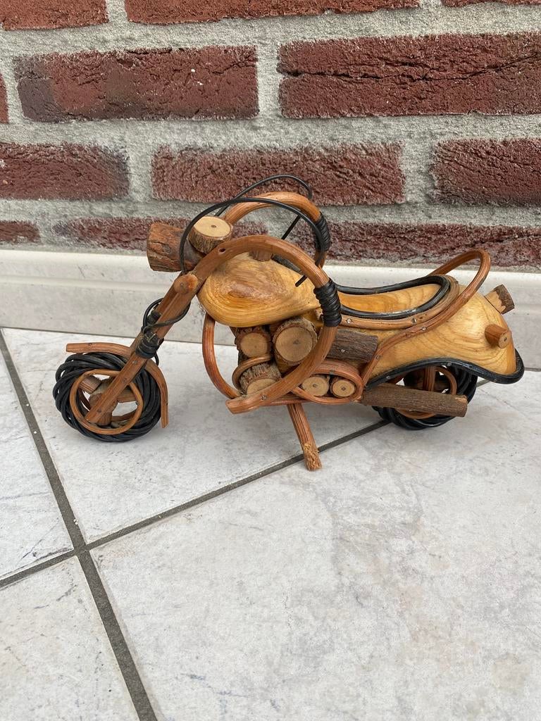 Motor van hout, Ophalen