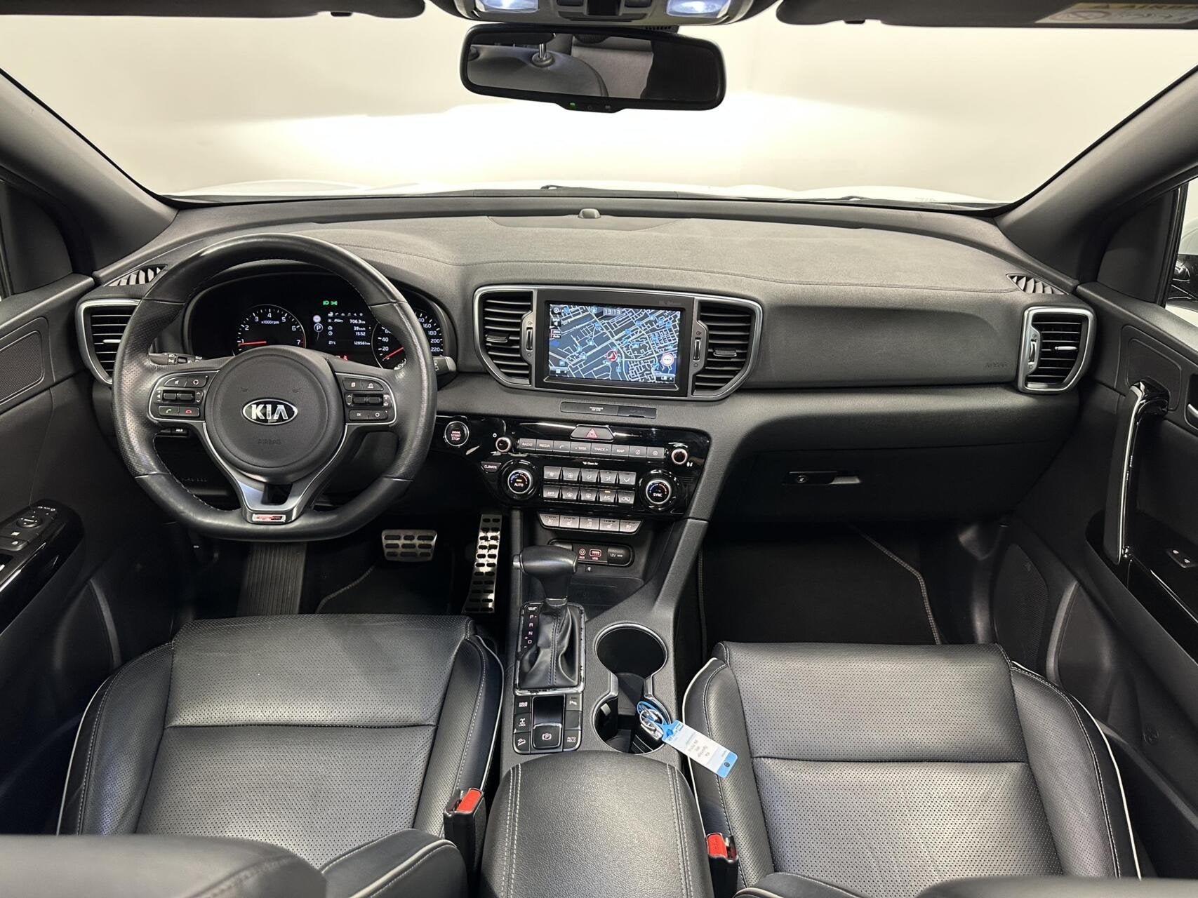 Kia Sportage 1.6 T-GDI 4WD GT-Line PANO LEER NAVI CAMERA STO, Auto's, Gebruikt, 4 cilinders, Met garantie (alle), Wit