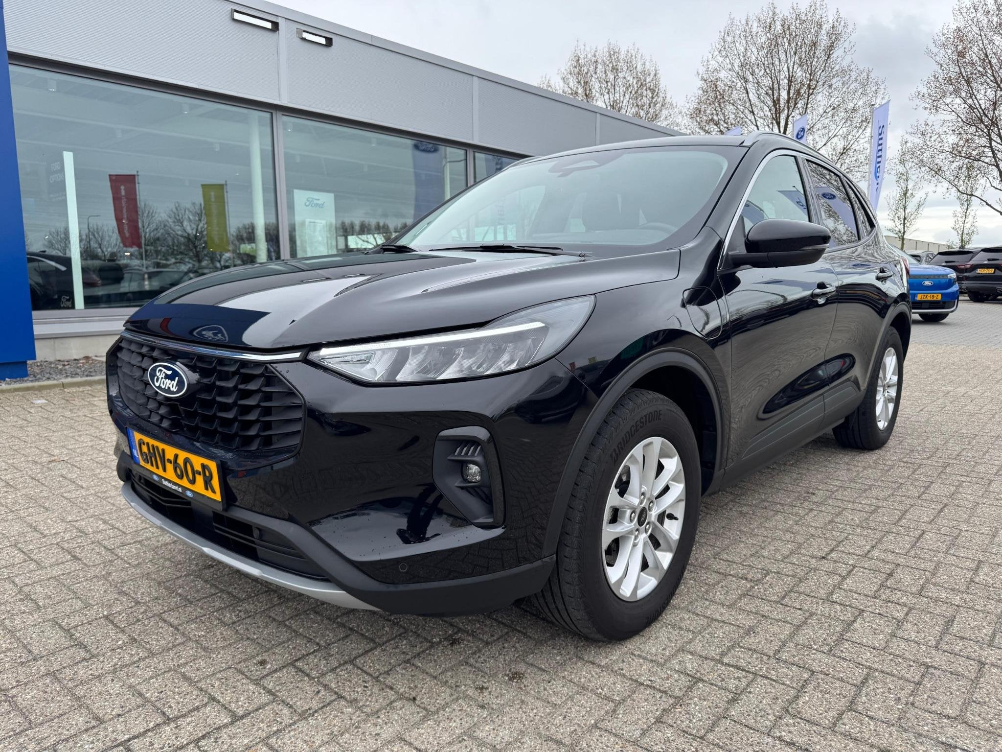 Ford Kuga 2.5 PHEV Titanium 243pk | Wegklapbare trekhaak | 2, Auto's, Gebruikt, Zwart, Bedrijf, Hybride Elektrisch/Benzine