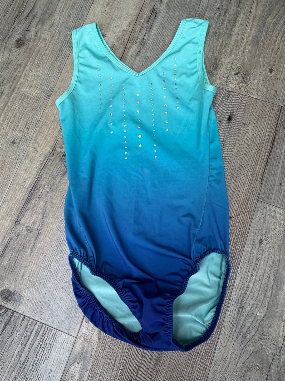 Turnpakje blauw/turquoise met glitters maat 152, Ophalen of Verzenden, Zo goed als nieuw, Meisje, Sport- of Zwemkleding