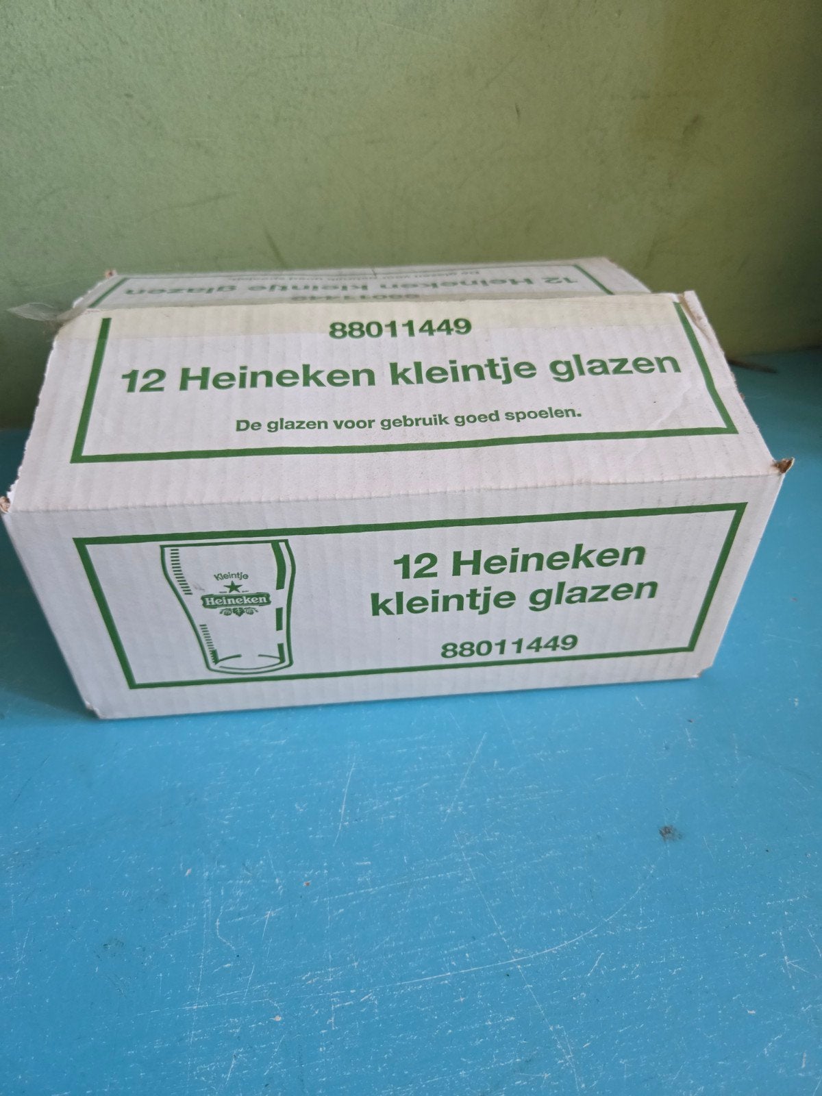 12 Heineken Kleintje Glazen in Doos, Ophalen of Verzenden, Zo goed als nieuw, Glas of Glazen, Heineken