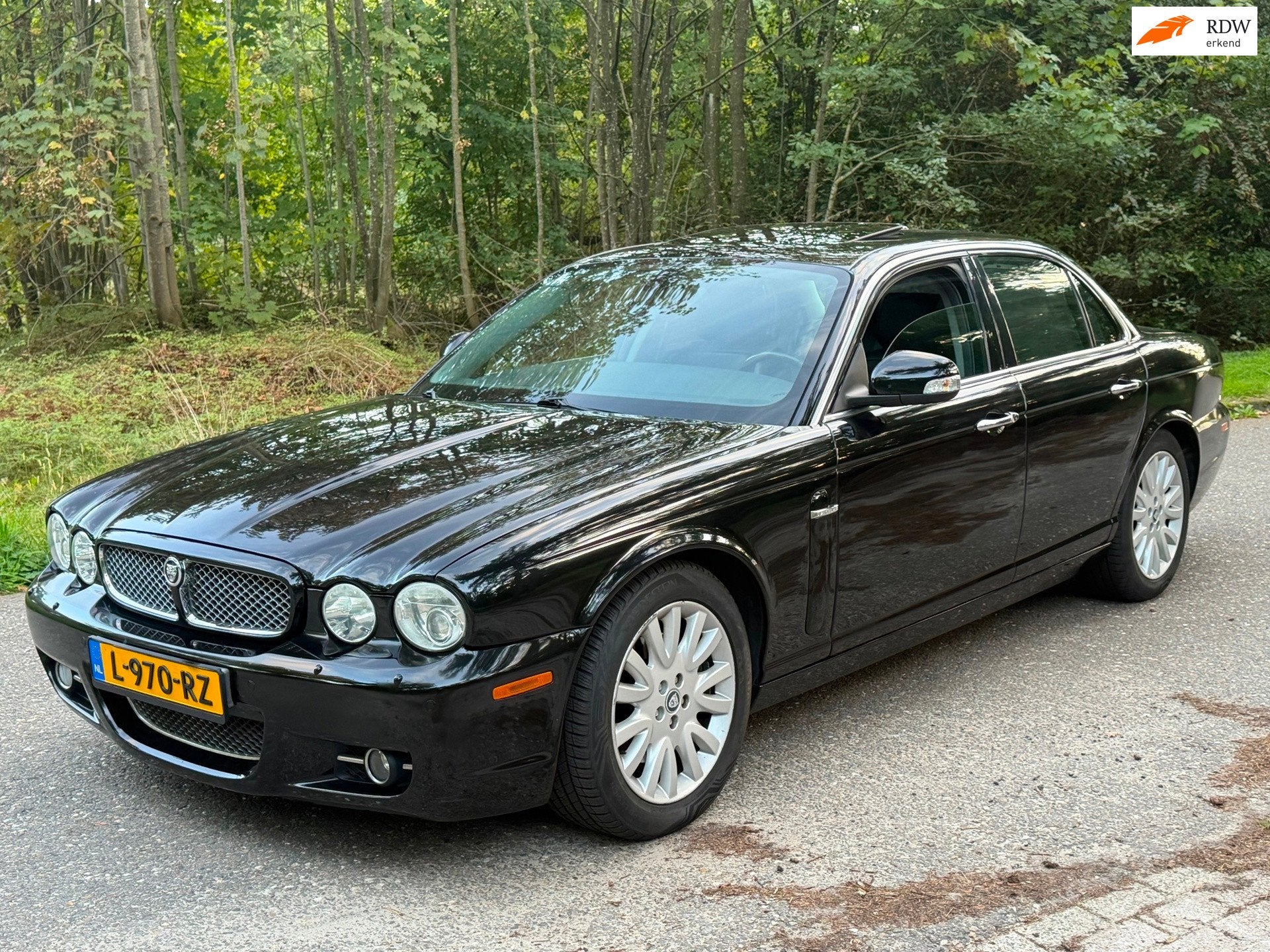 Jaguar XJ 2.7D V6 Portfolio Zwart 2009 Volle auto, Auto's, Dealer onderhouden, Achterwielaandrijving, Gebruikt, Zwart