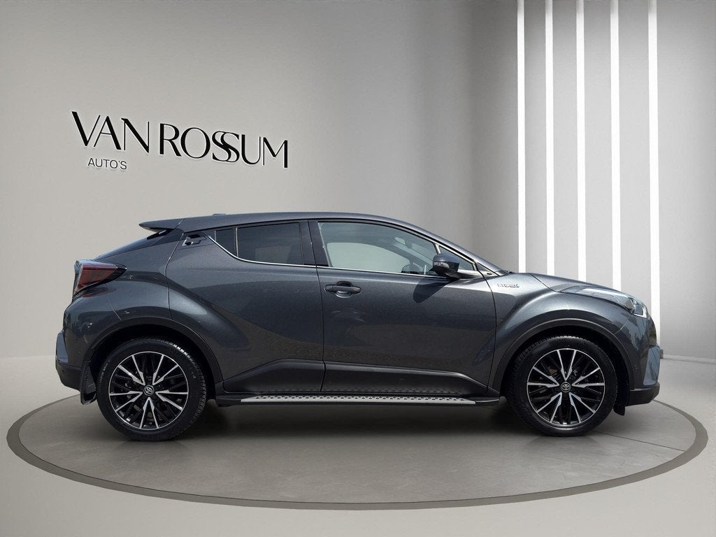 Toyota C-HR 1.8 Hybrid Executive | Navi | Camera | Half lede, Auto's, Toyota, Gebruikt, Euro 6, Leder en Stof, 122 pk