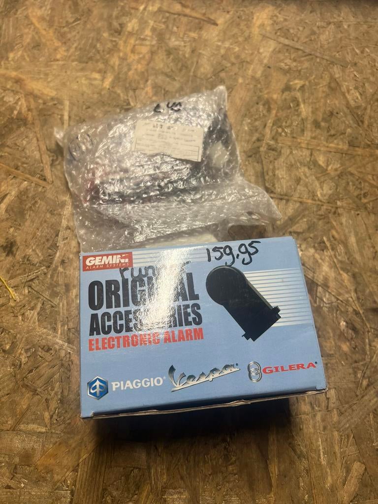 NIEUW piaggo e-lux alarm met verloopstekker, Ophalen of Verzenden