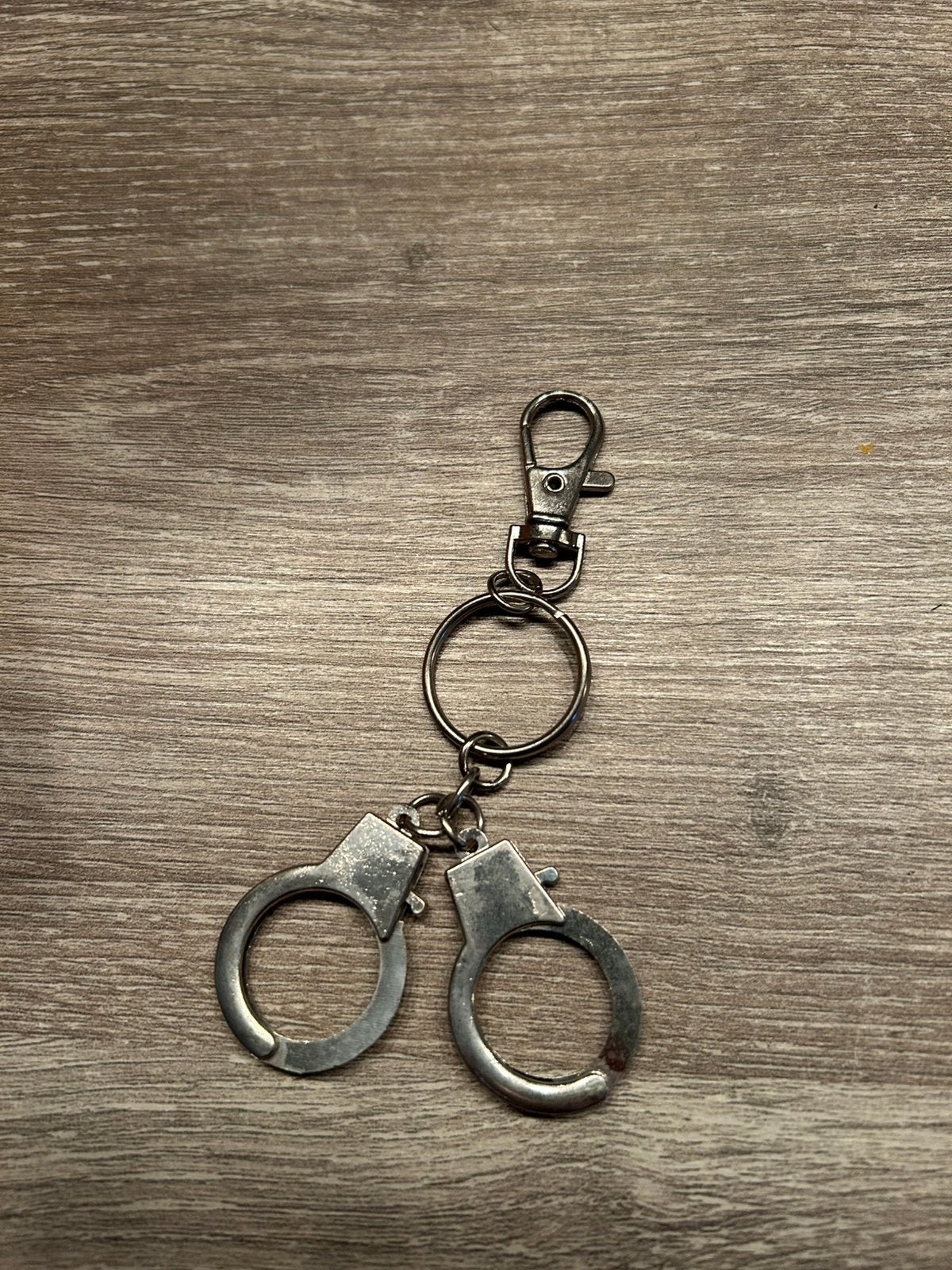 Sleutelhanger handboeien, Ophalen of Verzenden, Zo goed als nieuw
