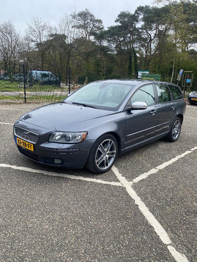 Volvo V50 2.4 140PK Geartronic 2007 Grijs, Auto's, Beige, 700 kg, Cruise Control, 2435 cc