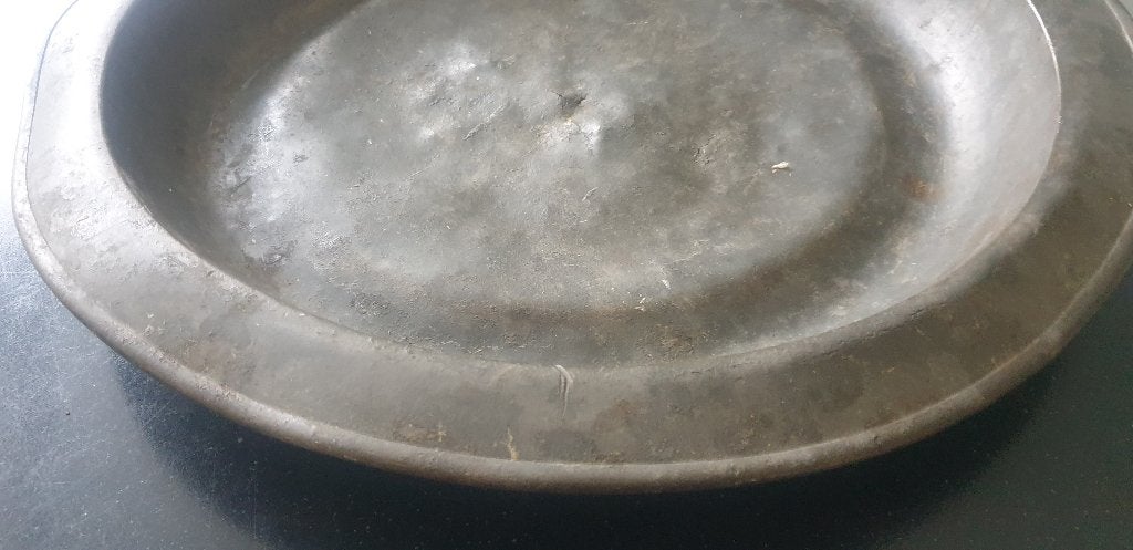 Oud, groot en zwaar tinnen bord, Ophalen