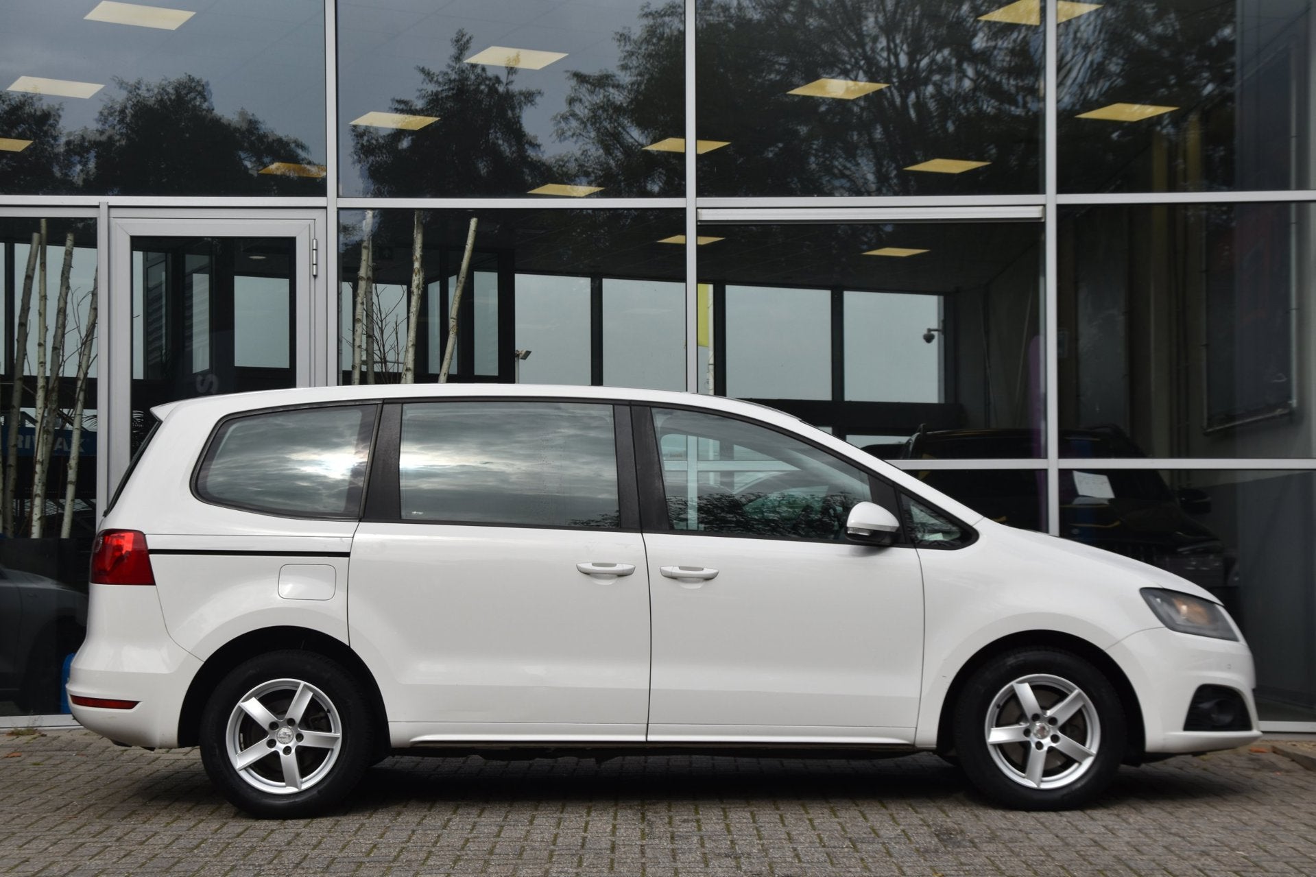 Seat Alhambra 1.4 TSI 7P | 1e Eigenaar | NAP | Navi | PDC |, Voorwielaandrijving, Stof, Zwart, 4 cilinders
