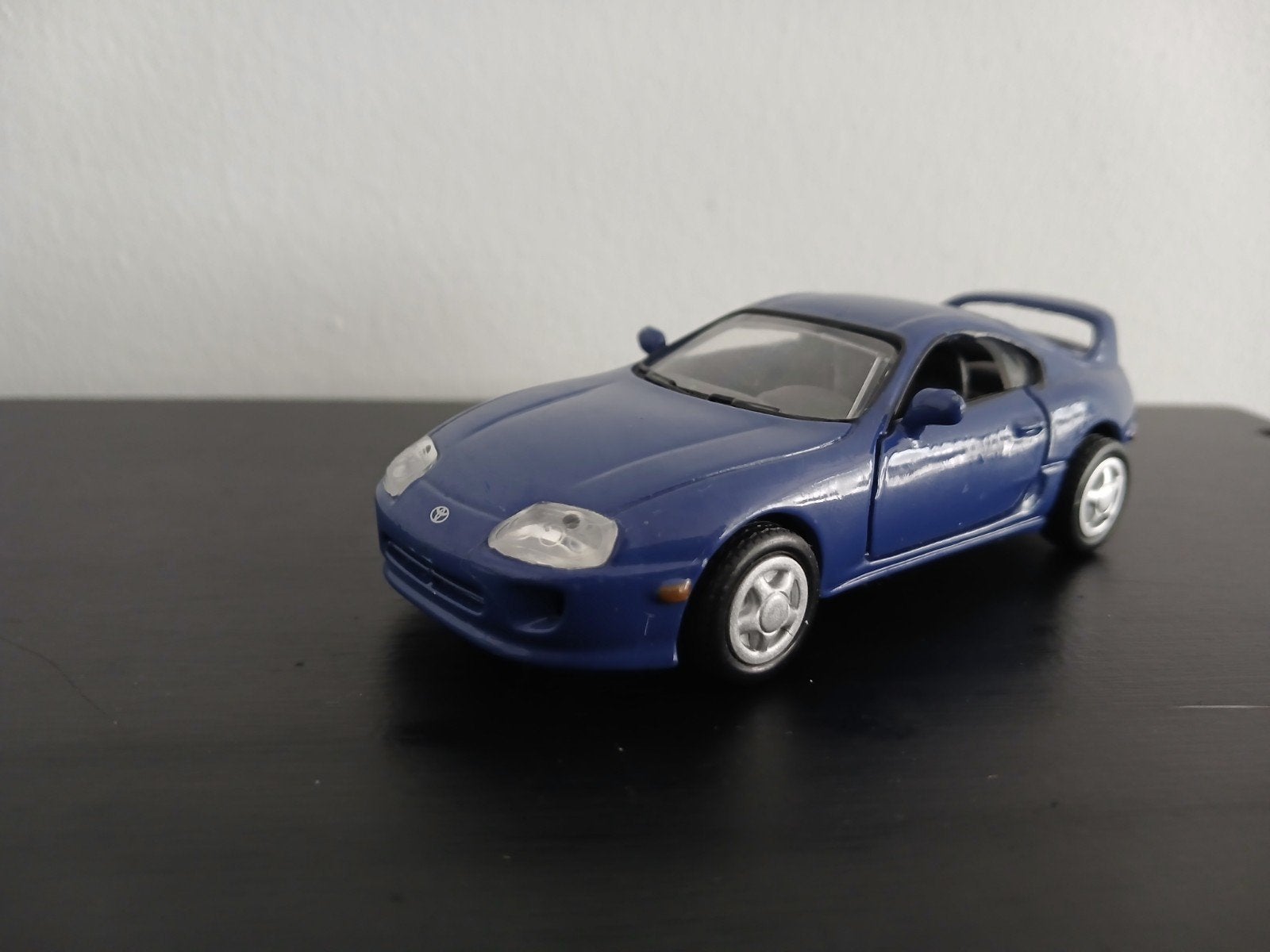 toyota supra 1:43  motormax, Hobby en Vrije tijd, Modelauto's | 1:43, Ophalen of Verzenden, Gebruikt, Auto, Overige merken