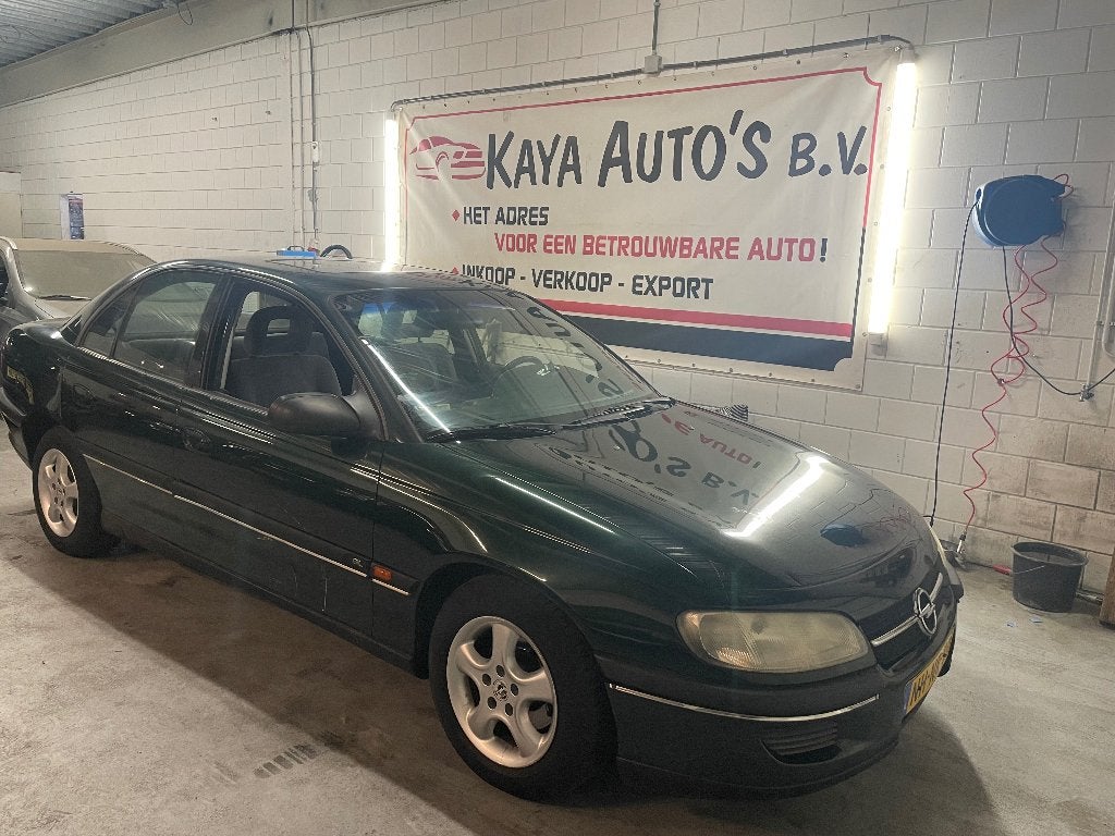 Opel Omega 2.0 I 16V AUT E2 1996 Groen, Auto's, Automaat, 1440 kg, 4 cilinders, Origineel Nederlands