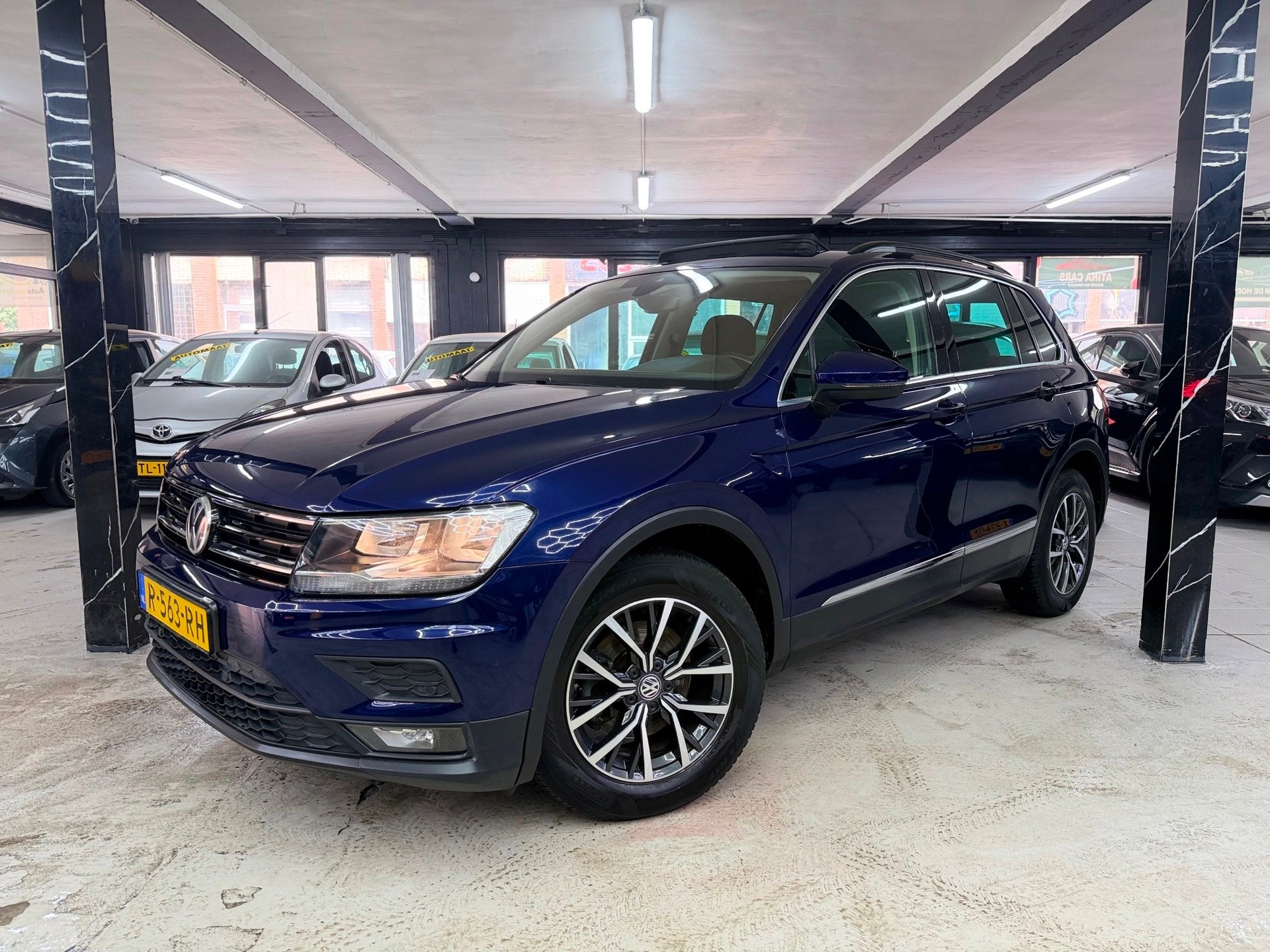 Volkswagen Tiguan 1.4 TSI ACT Highline Business R Pano, Euro 6, 4 cilinders, 150 pk, Blauw
