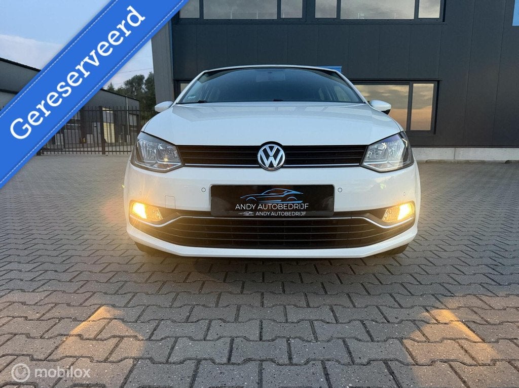 Volkswagen Polo 1.2 TSI Highline met automaat 2017, Auto's, Automatische klimaatregeling, Gebruikt, 4 cilinders, Wit