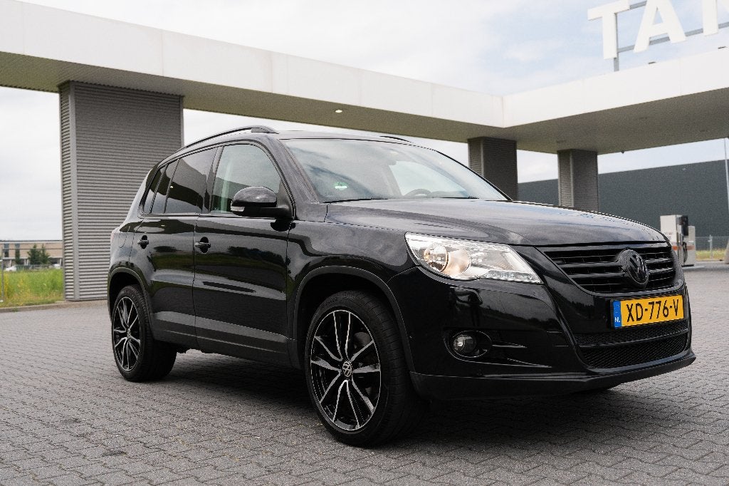 Volkswagen Tiguan 1.4 TSI 110KW 4MOTION 2010 Zwart, Auto's, 13 km/l, Stof, Zwart, 4 cilinders