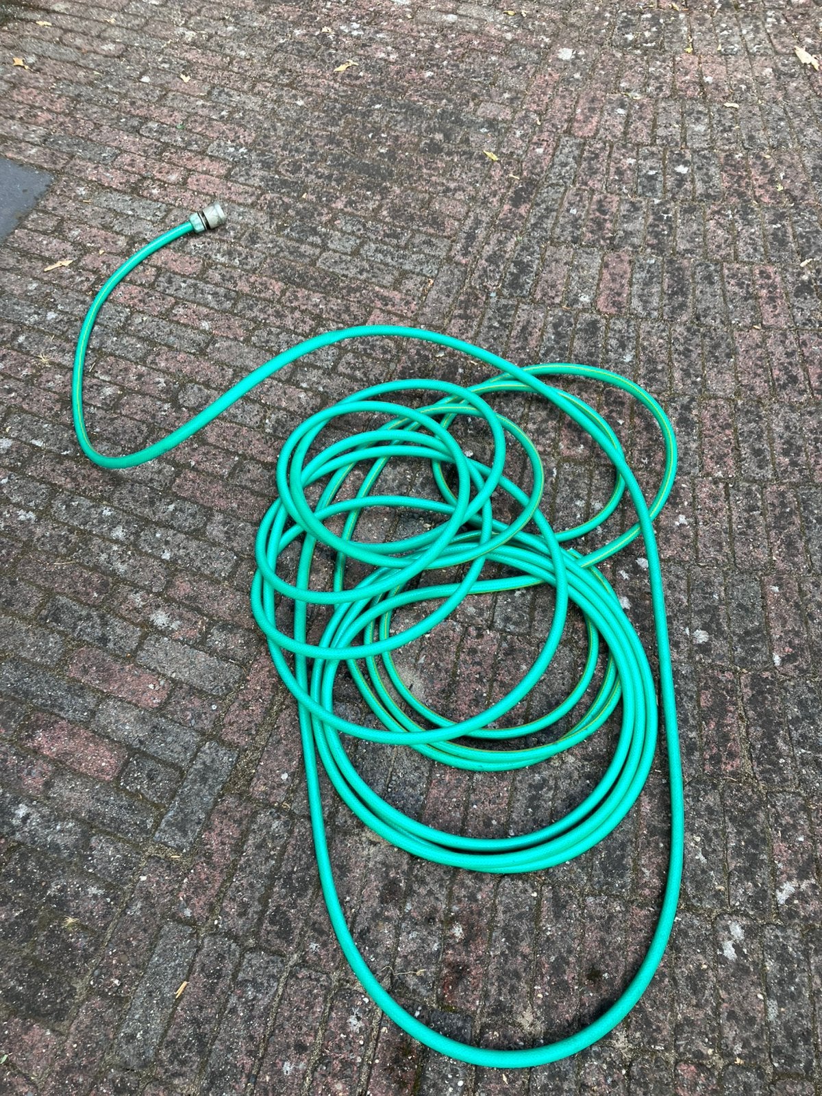 Ruim 10 meter tuinslang, Tuin en Terras, Tuinslangen, Ophalen of Verzenden, Gebruikt, Tuinslang