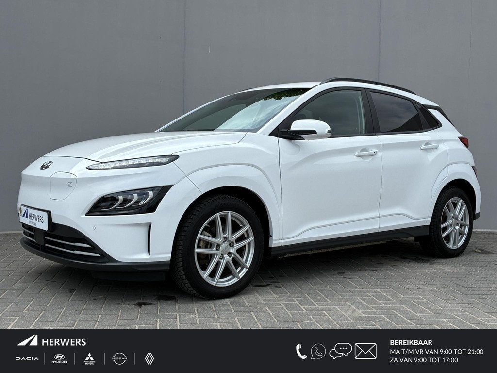 Hyundai Kona EV Fashion 64 kWh / €19.985,- ex btw / Grijs, Auto's, Hyundai, Stof, Gebruikt, Wit, 410 min
