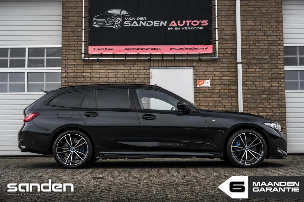 BMW 330e Touring xDrive M Sport|Pano|Mstoelen|Memory|LED|HUD, 1998 cc, 4 cilinders, Zwart, Leder