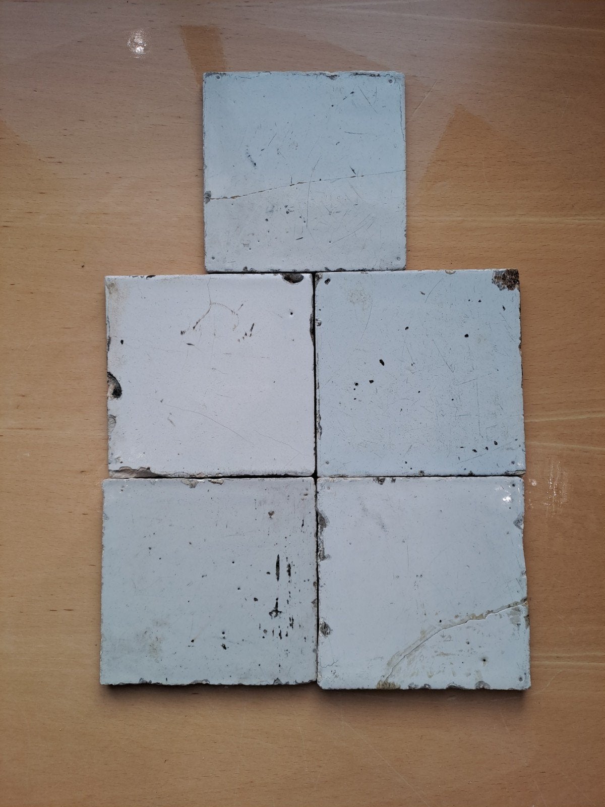 Tegels oud witjes, Ophalen