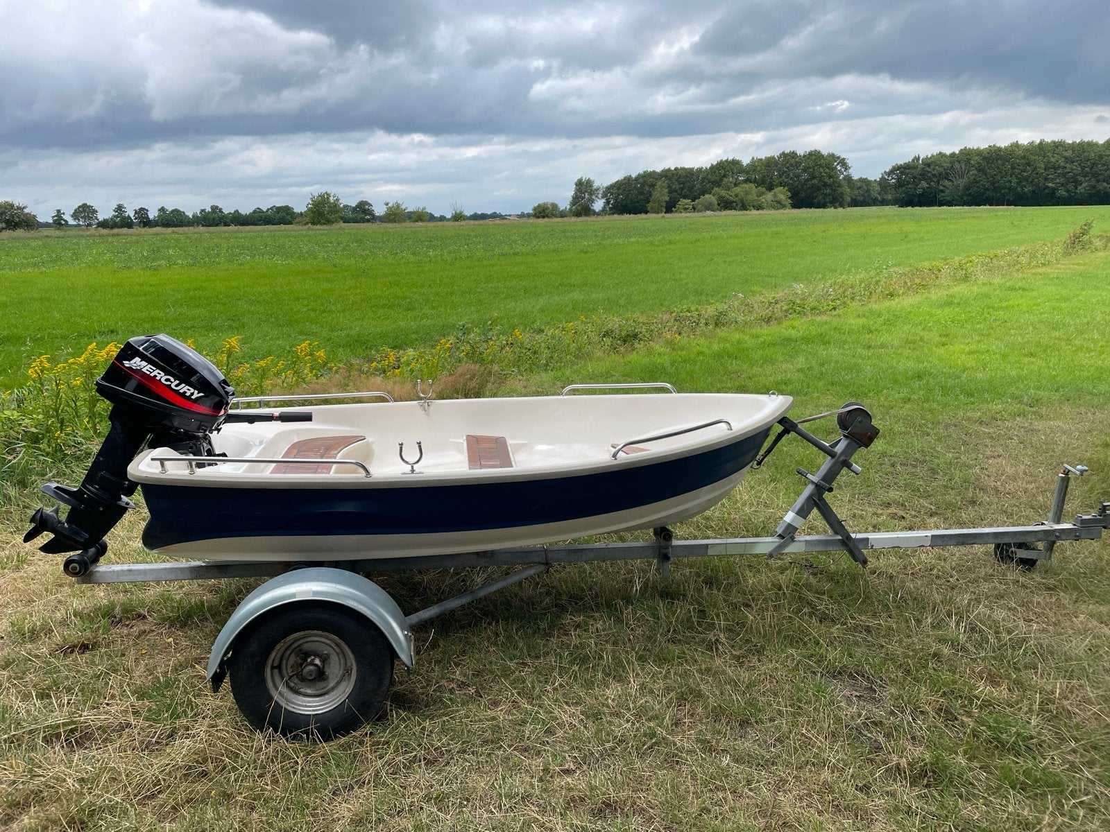 Polyester bootje met Mercury 9.9pk 2-takt motor, Ophalen, Gebruikt, Benzine, Buitenboordmotor