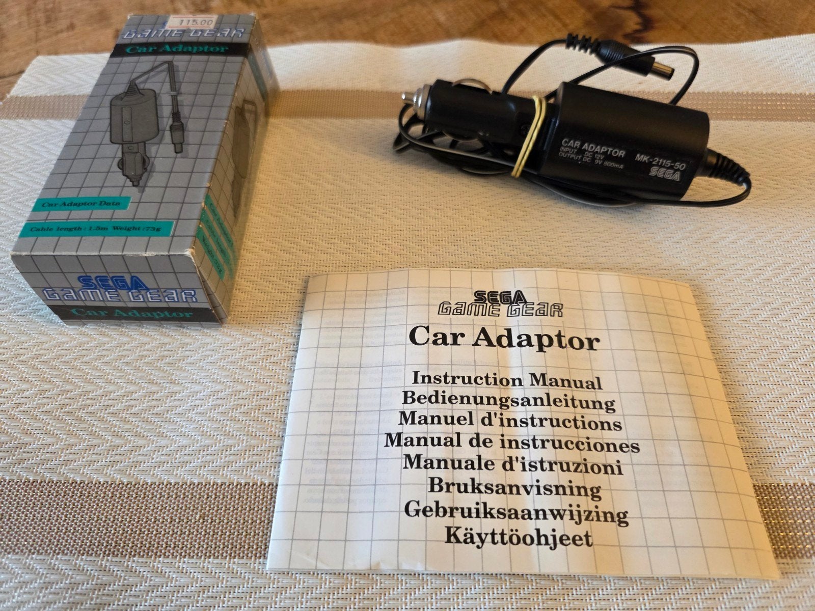 Sega Game Gear Car Adaptor MK-2115-50 met handleiding, Ophalen of Verzenden, Zo goed als nieuw, Zonder controller, Game Gear