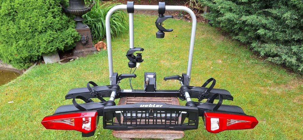 Uebler F24 fietsendrager voor 2-ebikes Nieuw in doos!, Auto diversen, Fietsendragers, Nieuw, Trekhaakdrager, 2 fietsen, Brede banden
