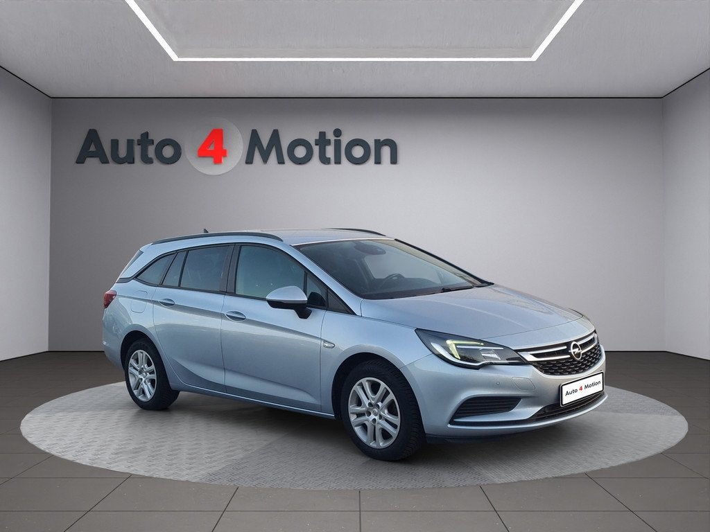 Opel Astra Sports Tourer 1.4 Turbo Cosmo Met ECC / NAVIG / C, Voorwielaandrijving, 125 pk, Gebruikt, Euro 6