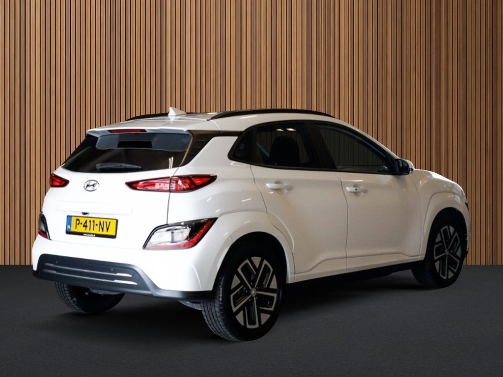 Hyundai Kona EV Comfort 64 kWh 3-Fase 1e-Eig. & Dealer-Onder, Auto's, 12 maanden, Gebruikt, Zwart, Verwarmde buitenspiegels
