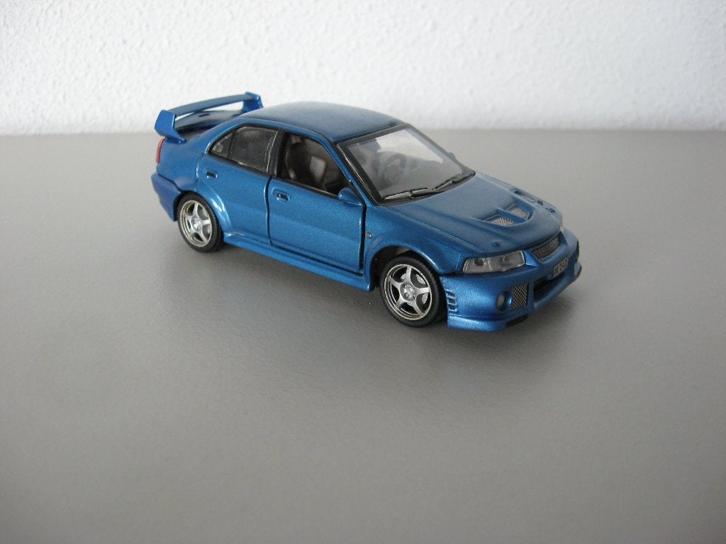Mitsubishi Lancer EVO, Ophalen of Verzenden, Zo goed als nieuw, Auto, Overige merken