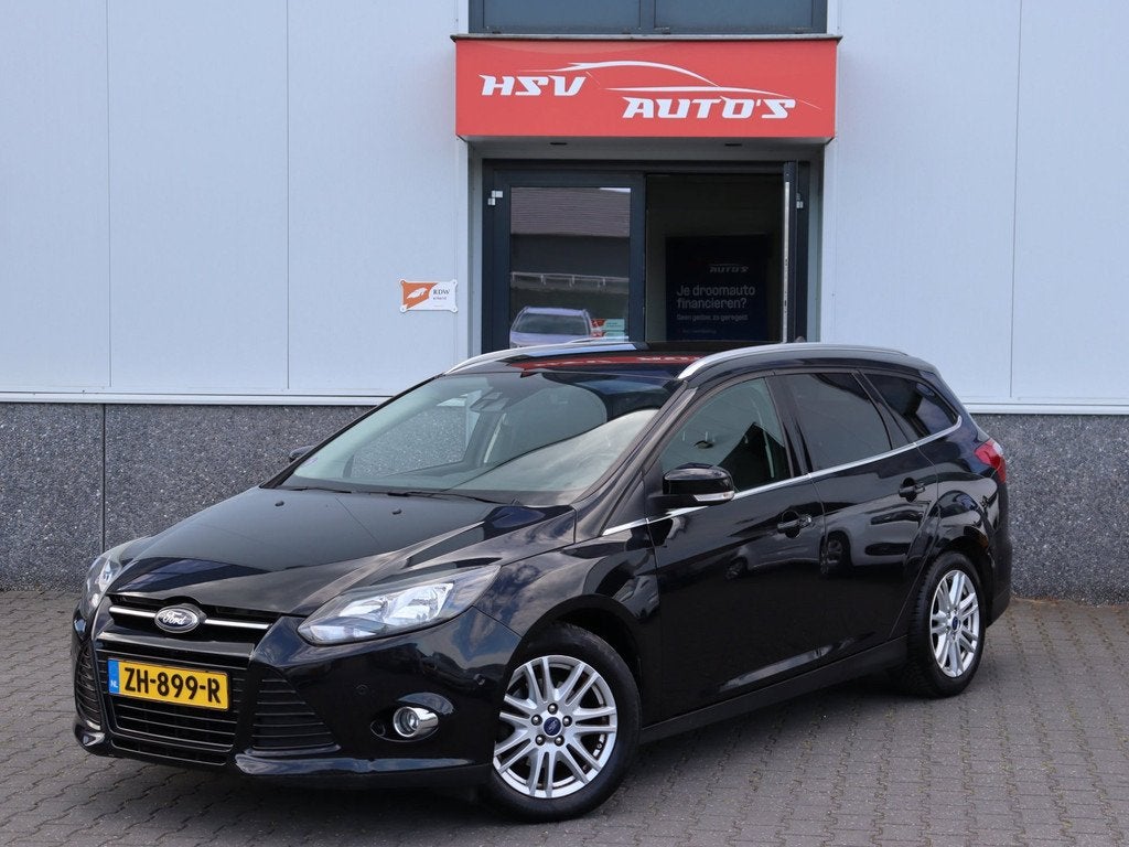 Ford Focus Wagon 1.0 EcoBoost Titanium navi 1/2 Leer cruise, Auto's, Euro 5, 125 pk, Gebruikt, Zwart