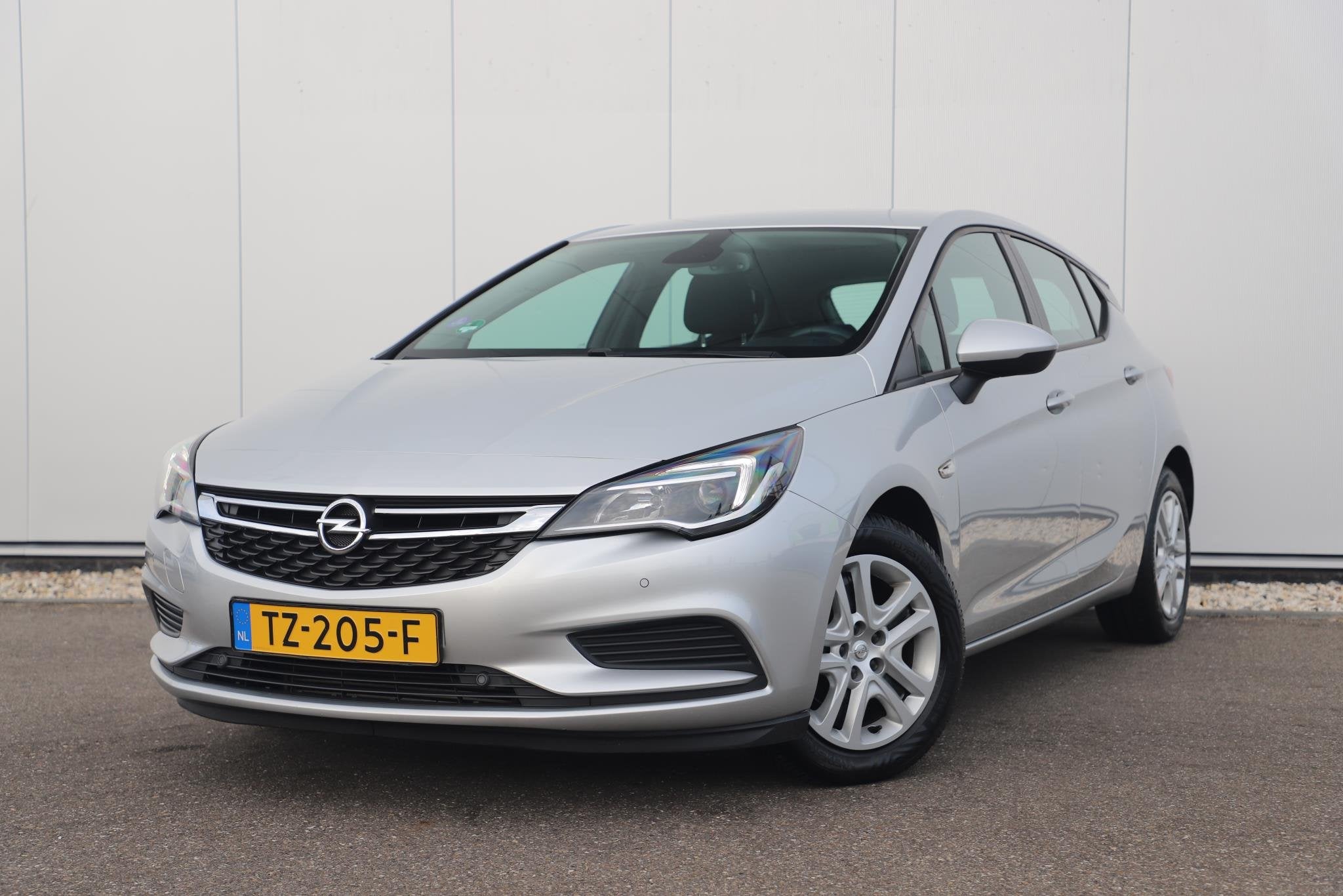 Opel Astra 1.0 Online Edition Navigatie Airco Cruise PDC Blu, Stof, Gebruikt, Euro 6, Met garantie (alle)