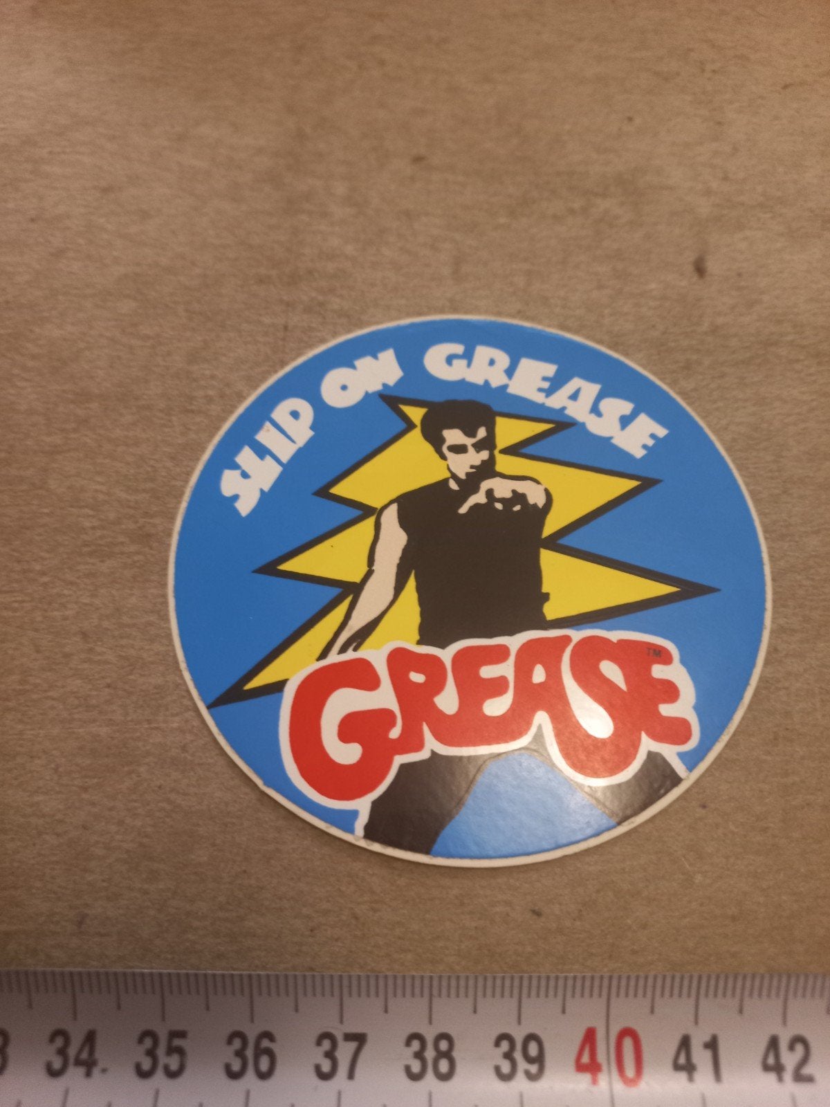 Vintage Grease Sticker - Slip On Grease, Ophalen of Verzenden, Gebruikt, Film, Tv of Omroep