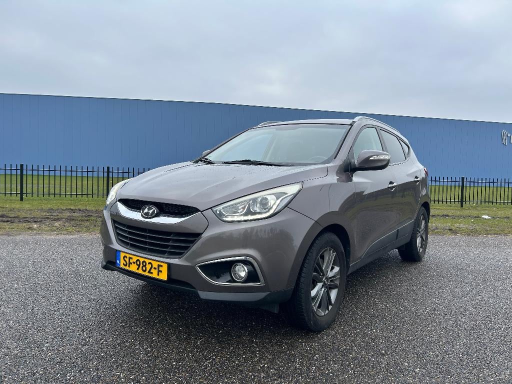 Hyundai iX35 2.0DSG | Climate | Cruise | Trekhaak | Car play, 4 cilinders, Bruin, Leder en Stof, 1600 kg