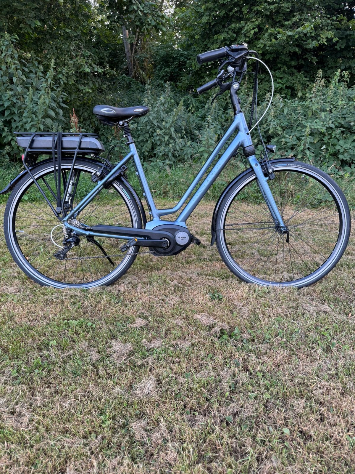 Koga Elektrische fiets Bosch Middenmotor Damesfiets/heren, Zo goed als nieuw, 51 tot 55 cm, 50 km per accu of meer, Ophalen