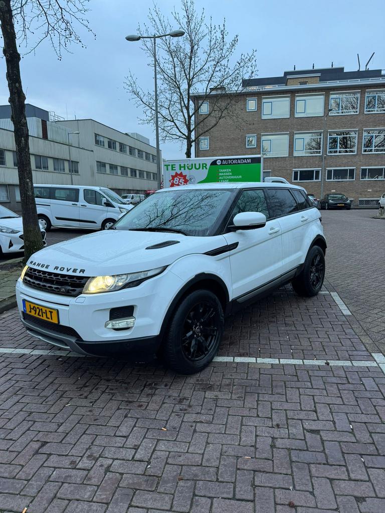 Land Rover Range Rover Evoque SI4 4WD AUT 2012 Wit, Auto's, Automaat, Euro 5, 1800 kg, Zwart