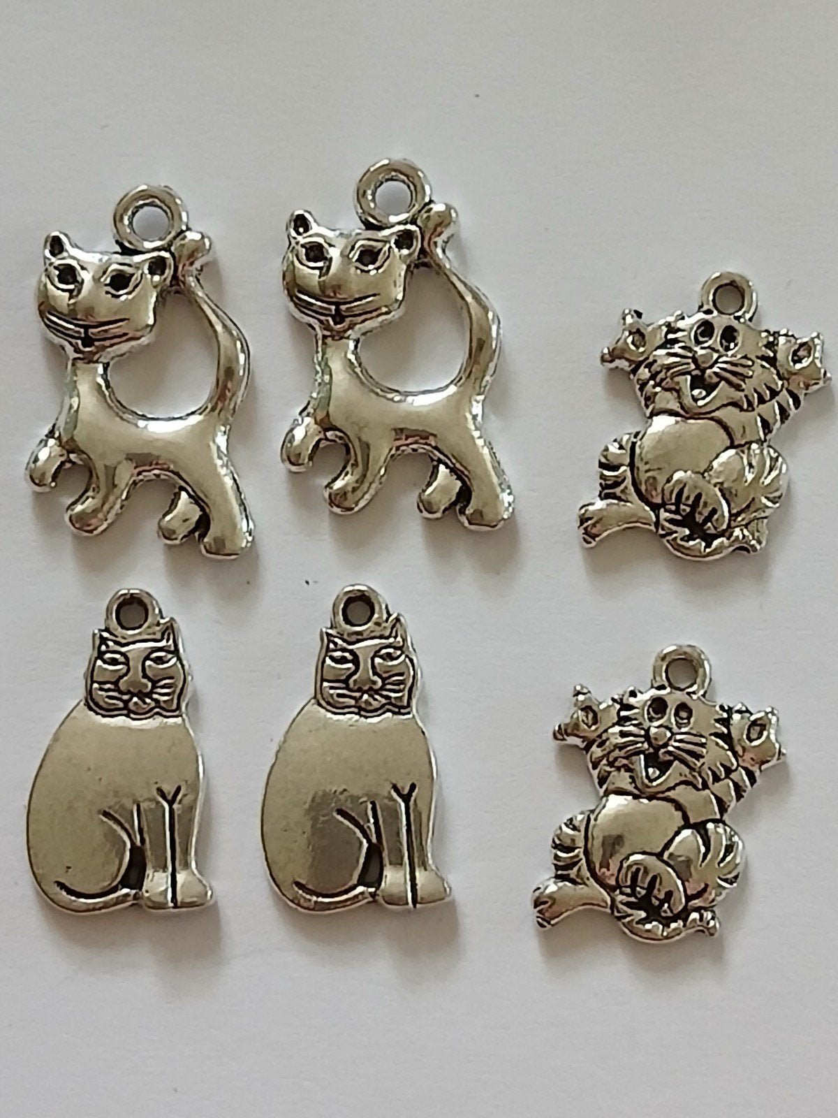 185. zilverkleurige katten bedels, Ophalen of Verzenden, Nieuw