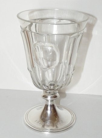 glas met zilveren voet 1878, Ophalen